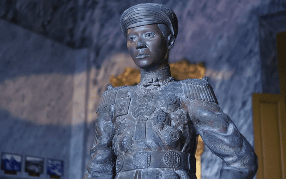 The statue captures the emperor in regal attire, embodying his authority